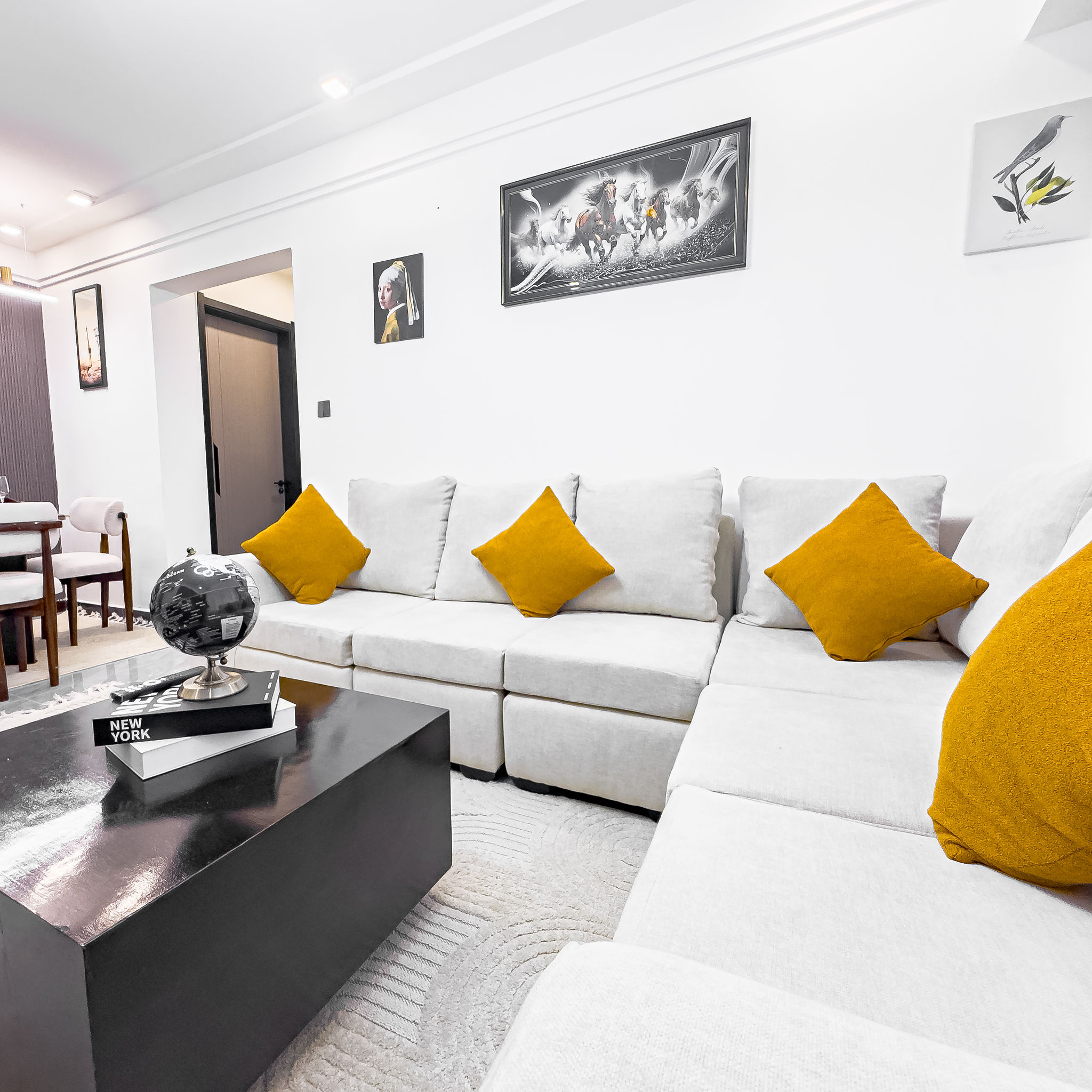 Living room sofa with accent cushions and coffee table